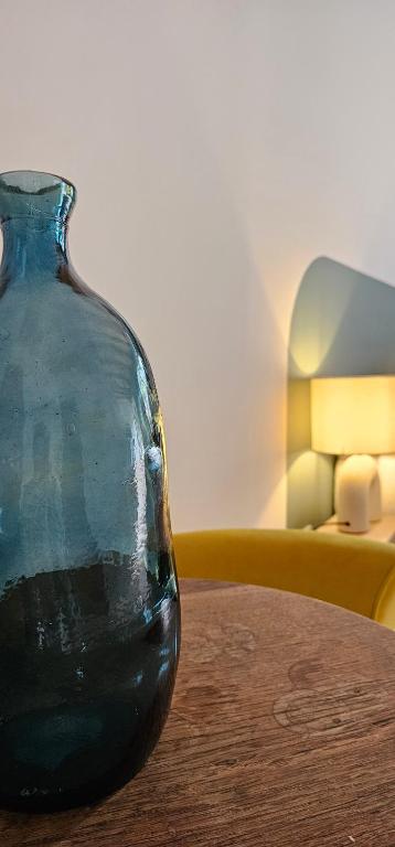 Postel nebo postele na pokoji v ubytování Chambre d'hôtes de charme L'Evasida Les Échappées Belles