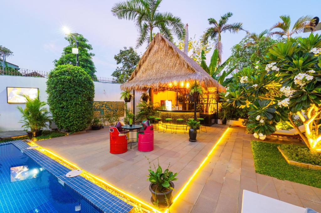 an image of a villa with a swimming pool at Sala Siem Reap Hotel in Siem Reap