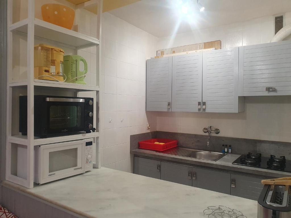 Kuchyň nebo kuchyňský kout v ubytování Apartamentos Grifovacances Consuegra 1