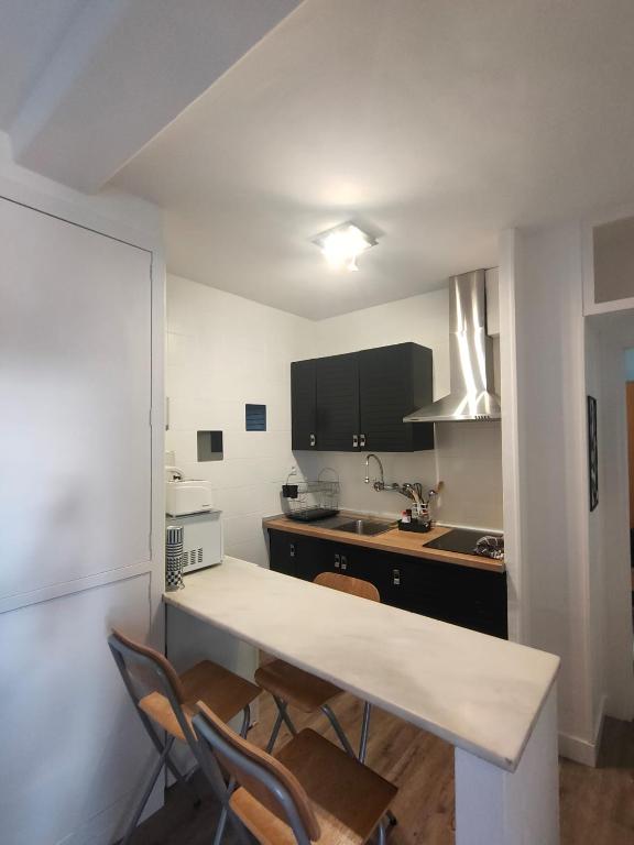 Kuchyň nebo kuchyňský kout v ubytování Apartamentos Grifovacances Consuegra 1