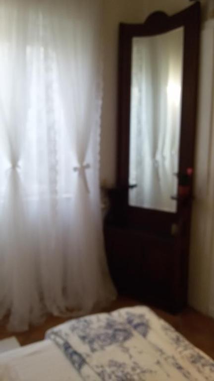 Postel nebo postele na pokoji v ubytování Villa Fiorita