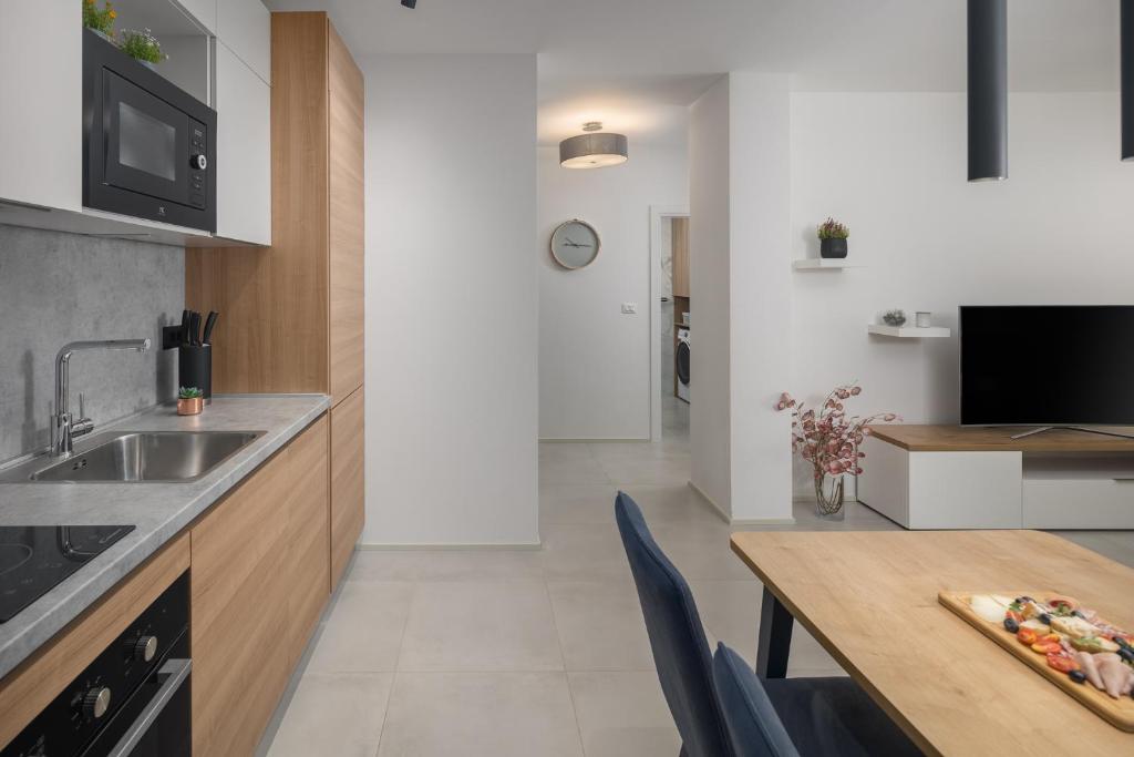 Kuchyňa alebo kuchynka v ubytovaní Apartment Corsy