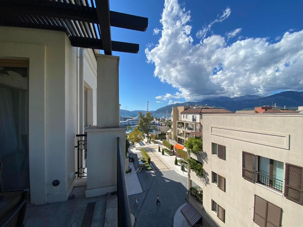a view from a balcony of a building at Porto Montenegro Luxury Apartment in Tivat