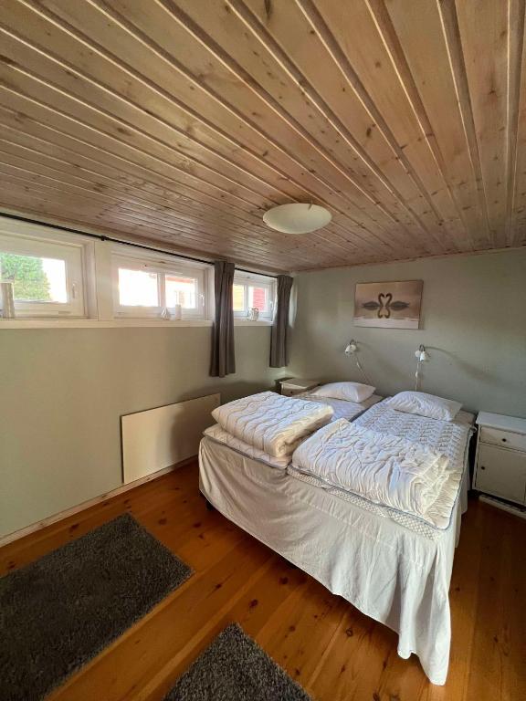 Postel nebo postele na pokoji v ubytování Strandvägen 6B Stig