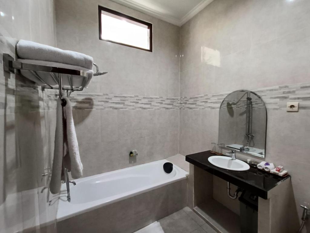 Koupelna v ubytování Wisata Bintang Hotel