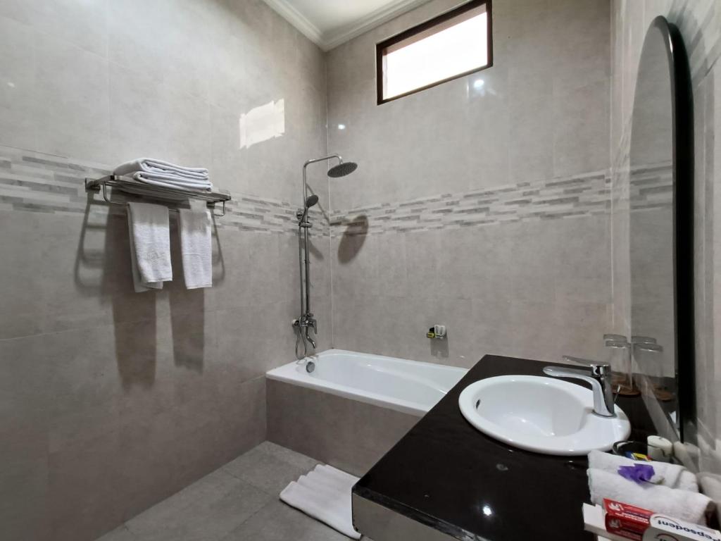 Koupelna v ubytování Wisata Bintang Hotel