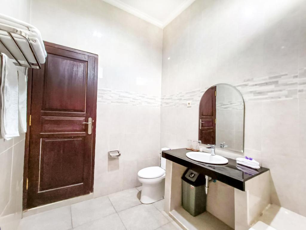 Koupelna v ubytování Wisata Bintang Hotel