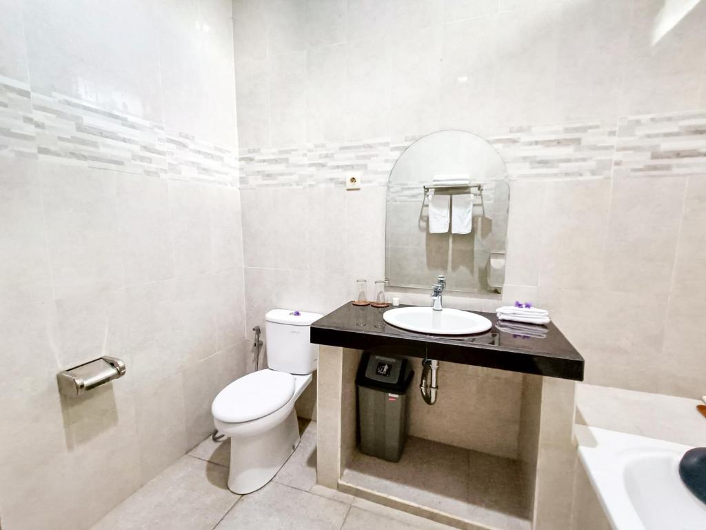 Koupelna v ubytování Wisata Bintang Hotel