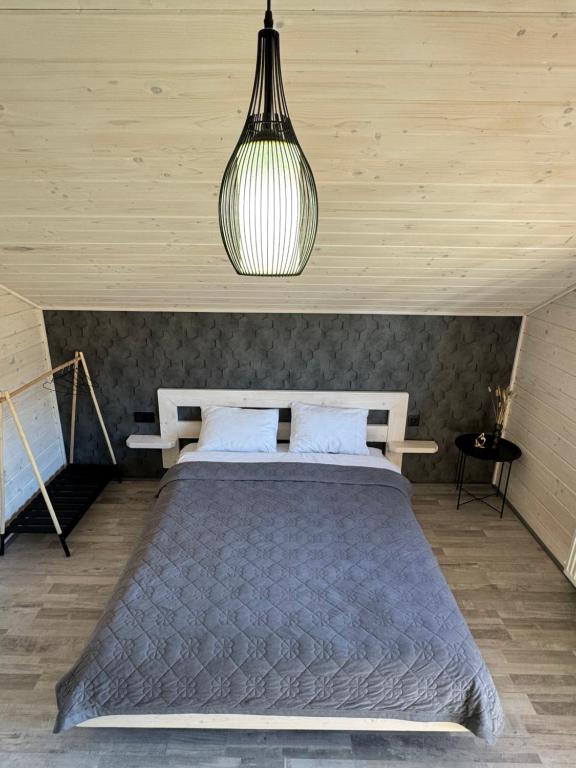 Postel nebo postele na pokoji v ubytování Weekend house