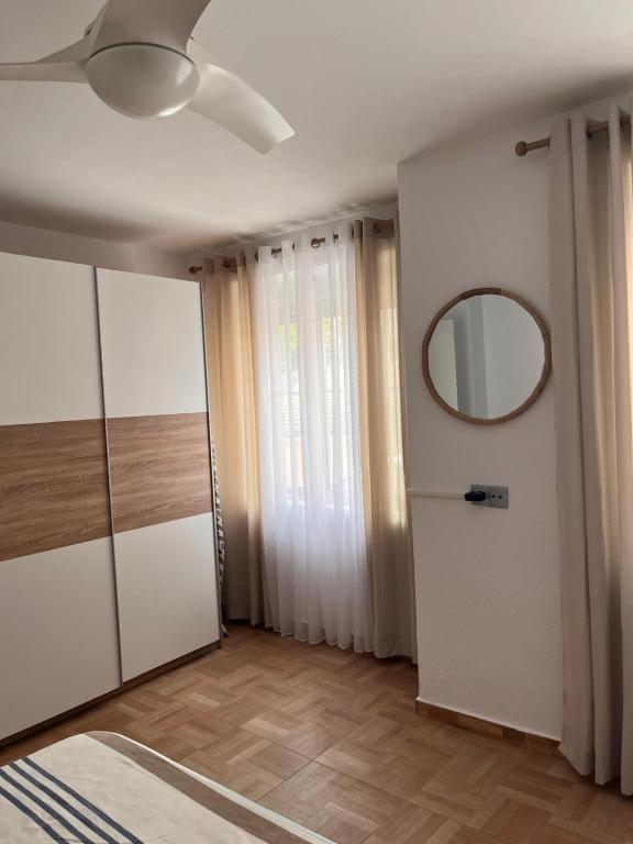 Postel nebo postele na pokoji v ubytování Apartament Lemon Paradise