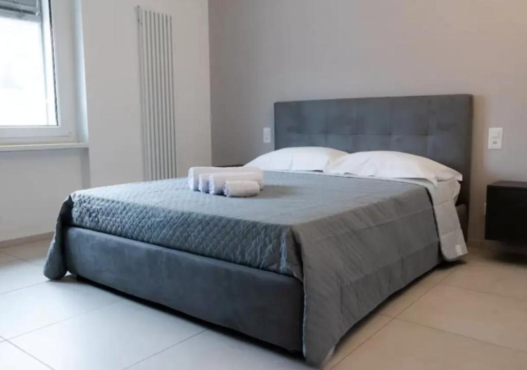 Letto o letti in una camera di Urban Residence by Quokka 360 - Modern apartments in Lugano