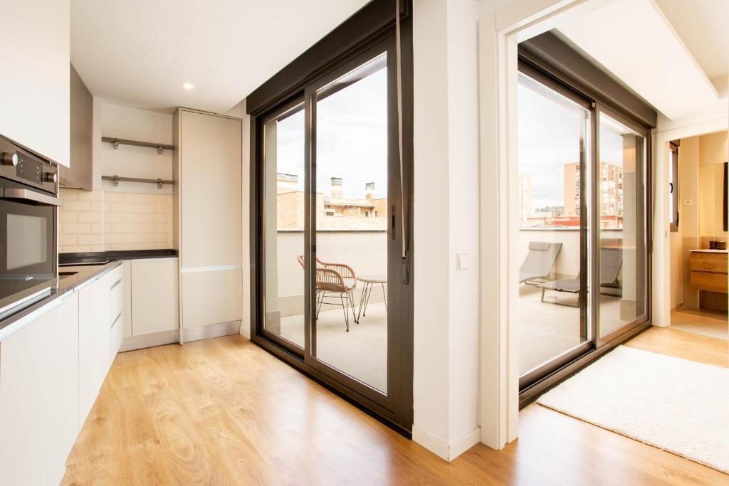 Kuchyň nebo kuchyňský kout v ubytování Rubik en Madrid