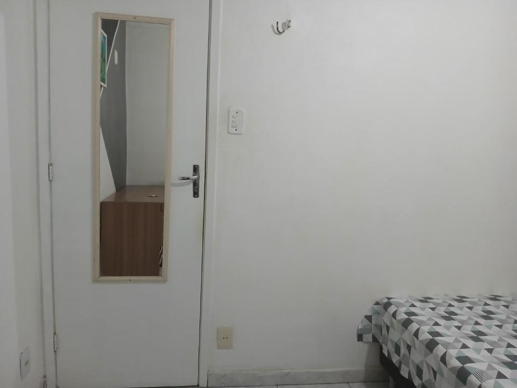 Postel nebo postele na pokoji v ubytování Quarto Privado Cama Casal ou Solteiros Apto