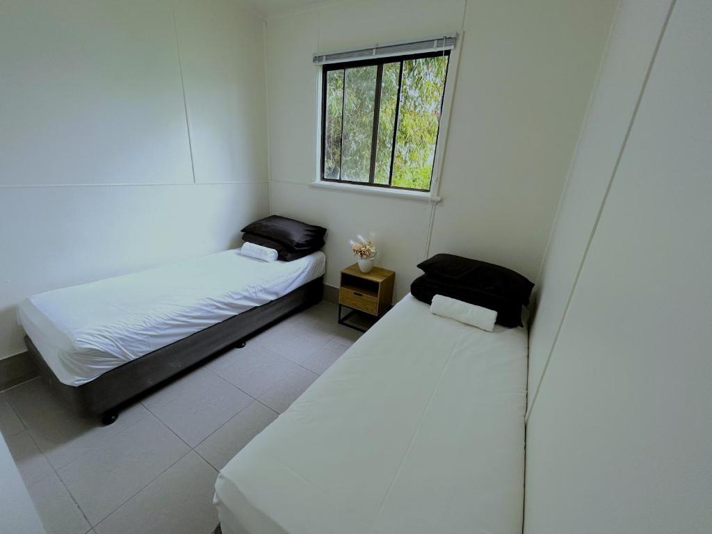 Postel nebo postele na pokoji v ubytování Mandurah Coastal Holiday Park