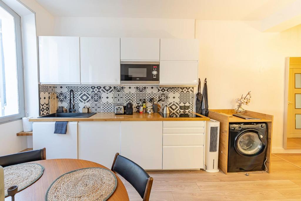 Kuchyňa alebo kuchynka v ubytovaní Belle rénovation moderne au coeur du Panier