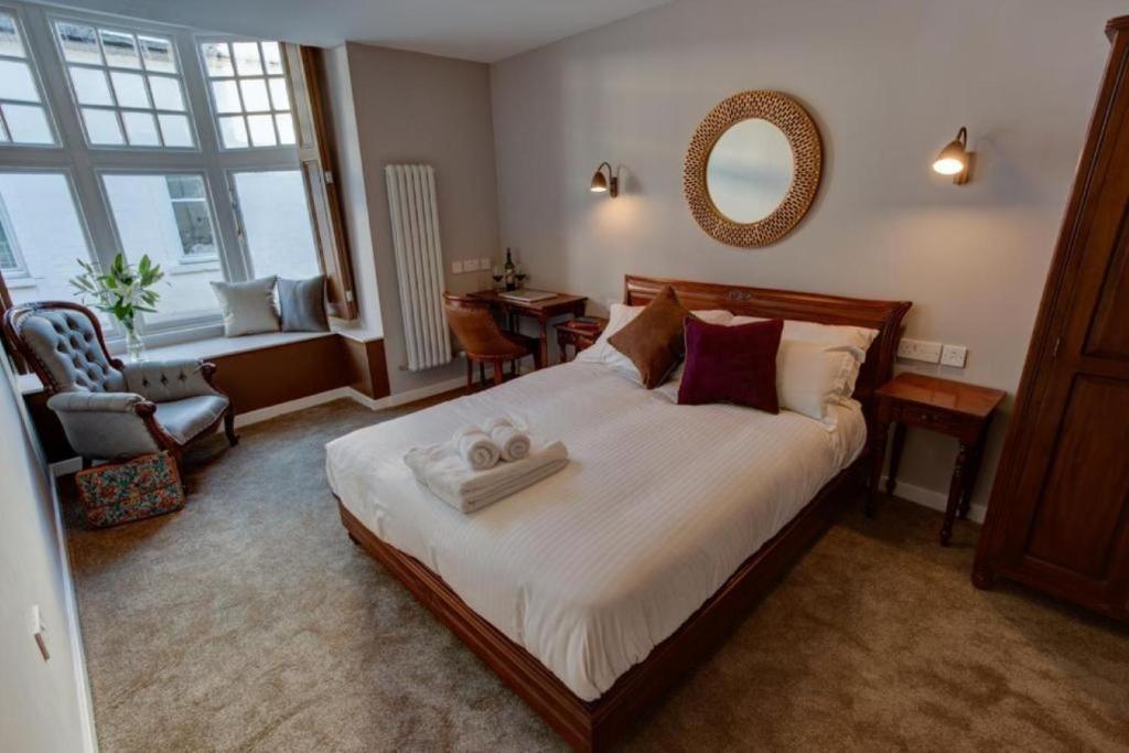 Postel nebo postele na pokoji v ubytování Friars Wynd Guest Rooms