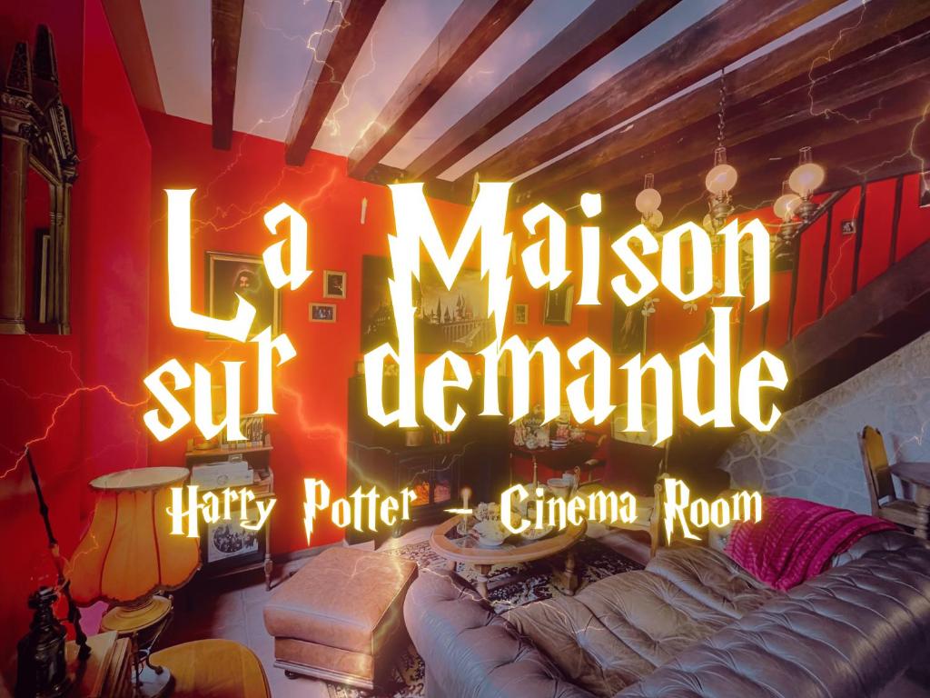 a neon sign in a living room with a couch at La maison sur demande - Harry Potter - Ciné Room in Mazangé
