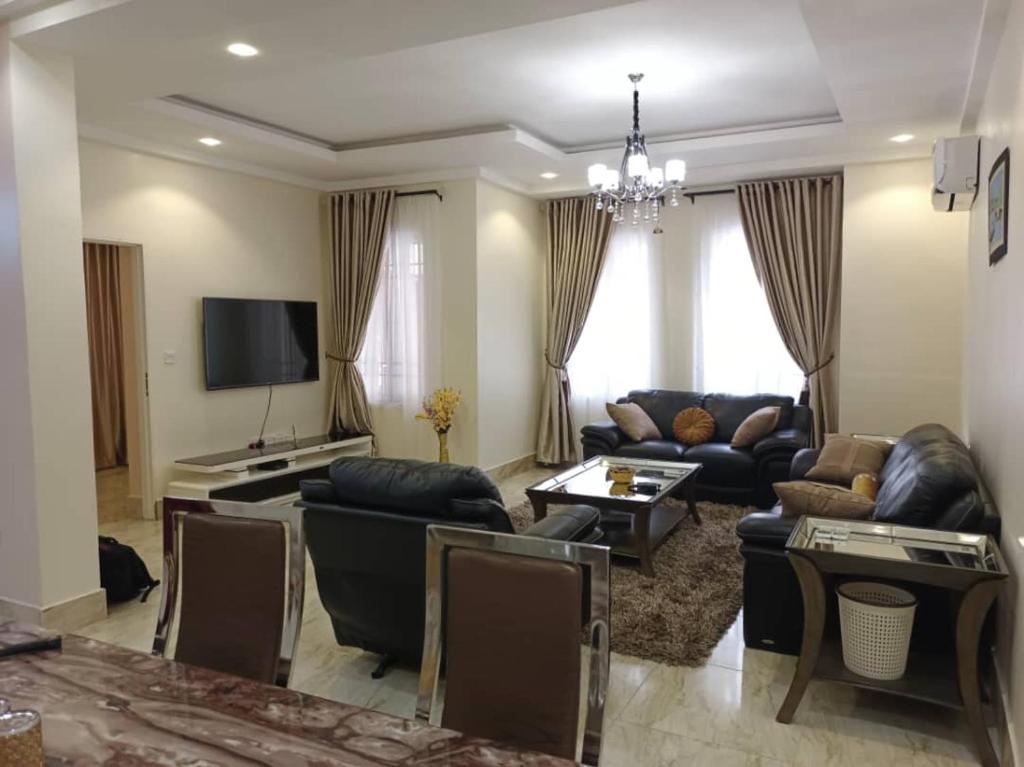TV a/nebo společenská místnost v ubytování Unit 1 apartments