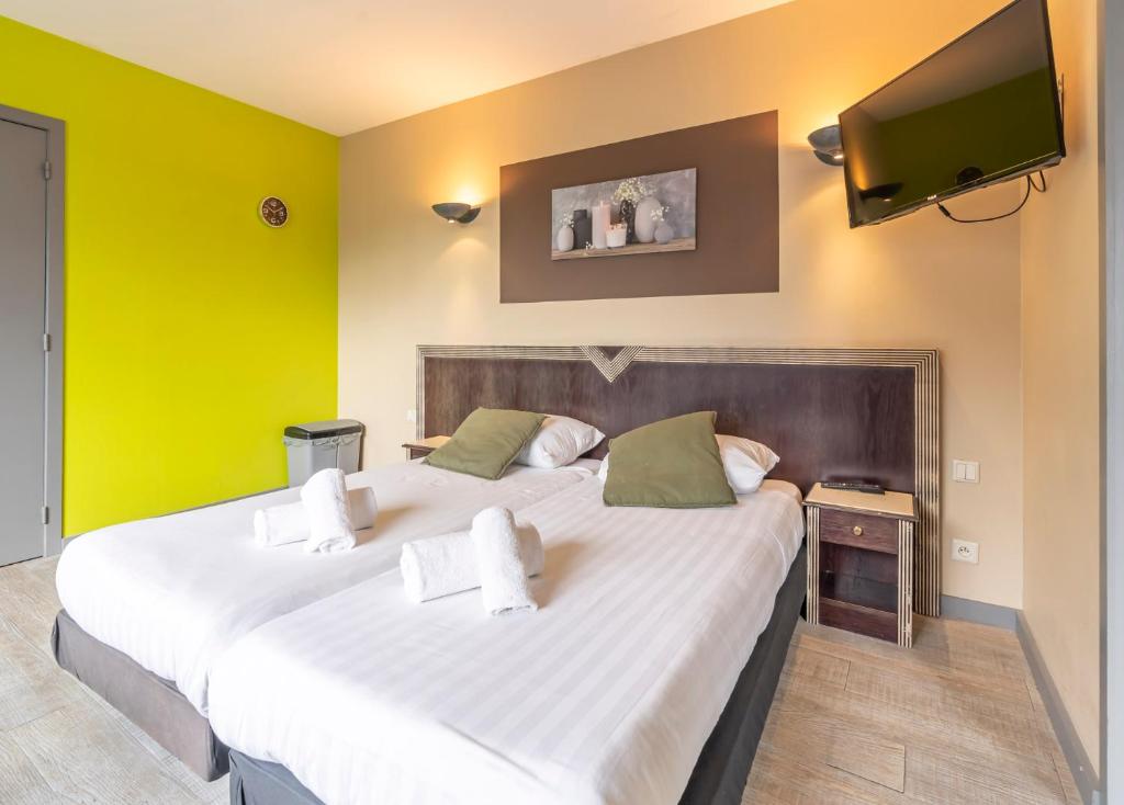 Postel nebo postele na pokoji v ubytování Sleep & Go Blankenberge