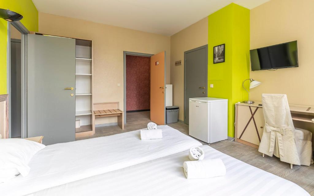 Postel nebo postele na pokoji v ubytování Sleep & Go Blankenberge