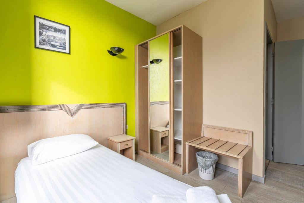 Postel nebo postele na pokoji v ubytování Sleep & Go Blankenberge