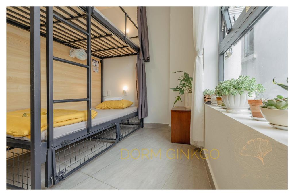 Postel nebo postele na pokoji v ubytování Aki 秋 Hostel