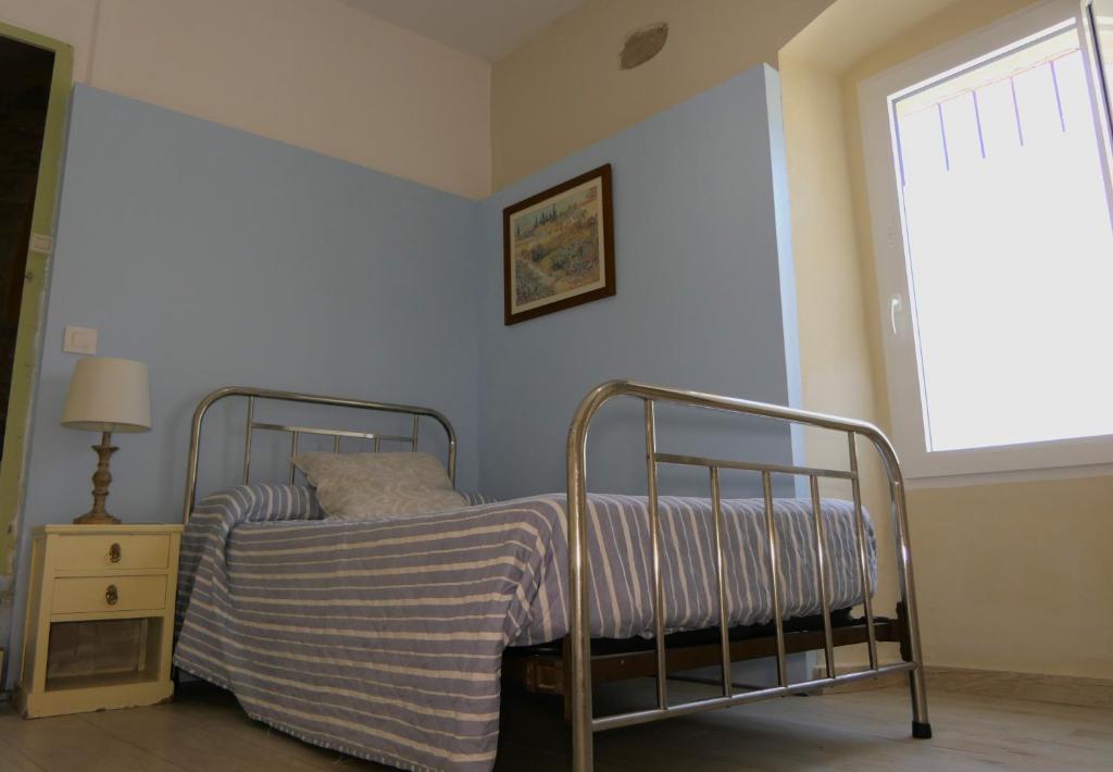 Posteľ alebo postele v izbe v ubytovaní Apartamentos Altozano