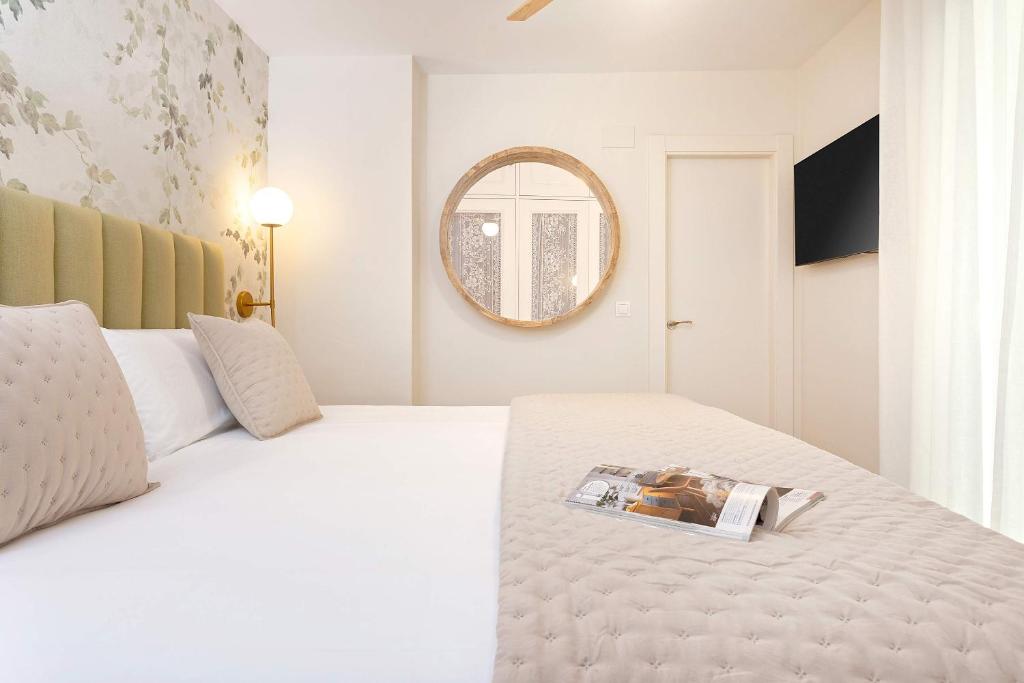 Posteľ alebo postele v izbe v ubytovaní Genteel Home Recogidas
