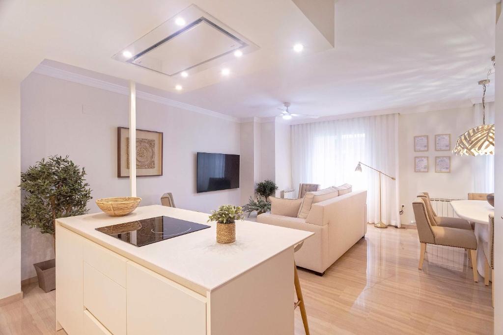 Televízia a/alebo spoločenská miestnosť v ubytovaní Genteel Home Recogidas
