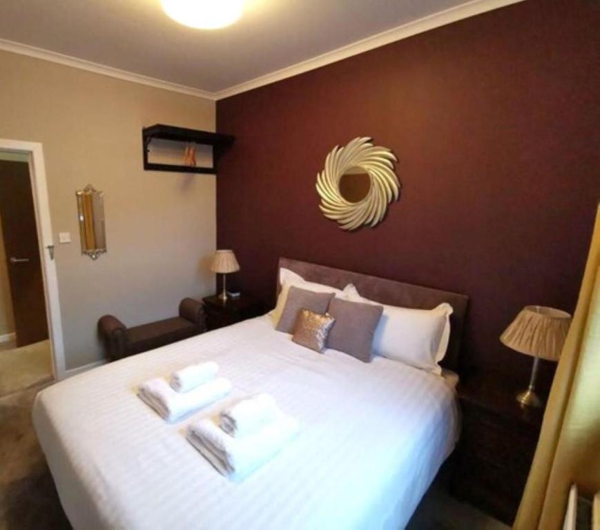 Postel nebo postele na pokoji v ubytování Friars Wynd Guest Rooms
