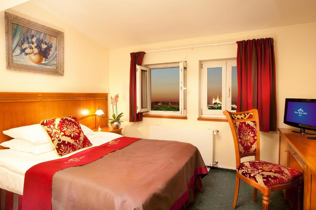 Postel nebo postele na pokoji v ubytování Green Garden Hotel