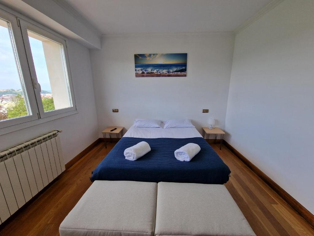 Postel nebo postele na pokoji v ubytování Pensión Aussie II