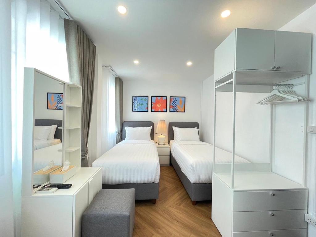 Cama ou camas em um quarto em Sleep Walker Poshtel