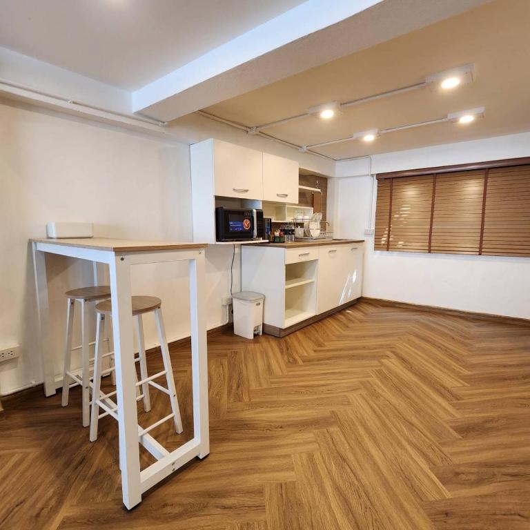 A cozinha ou cozinha compacta de Sleep Walker Poshtel