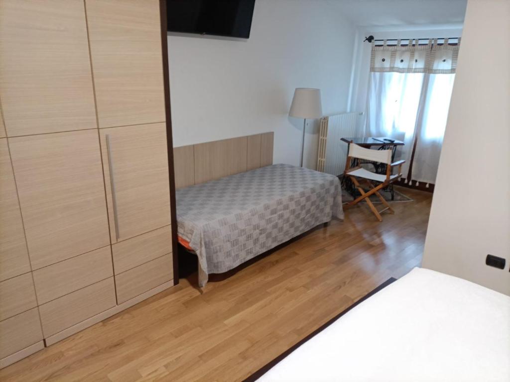 Postel nebo postele na pokoji v ubytování Akihouse by Mauro