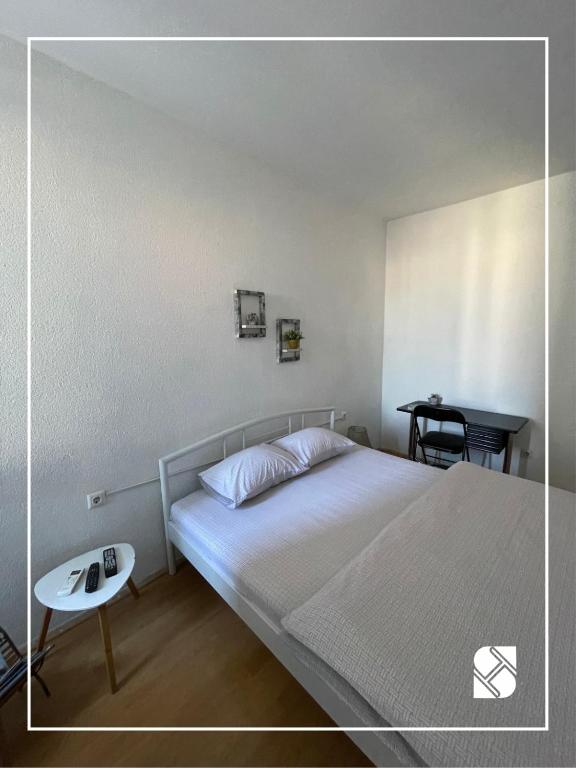 Postel nebo postele na pokoji v ubytování Sky Hostel