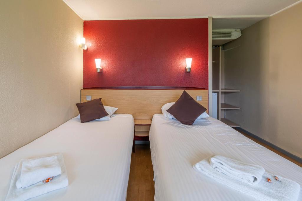 Postel nebo postele na pokoji v ubytování Sleep & Go Brugge