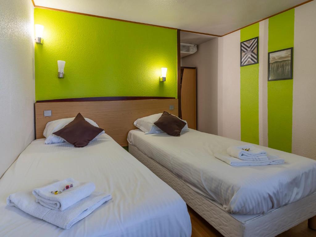 Postel nebo postele na pokoji v ubytování Sleep & Go Brugge