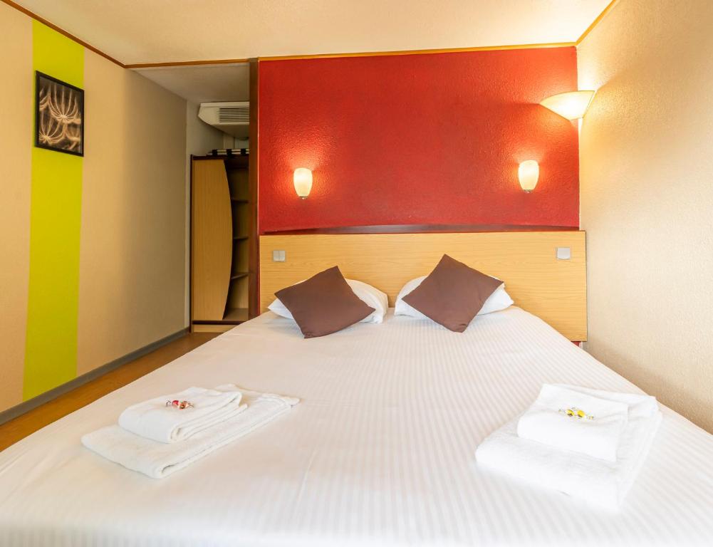 Postel nebo postele na pokoji v ubytování Sleep & Go Brugge