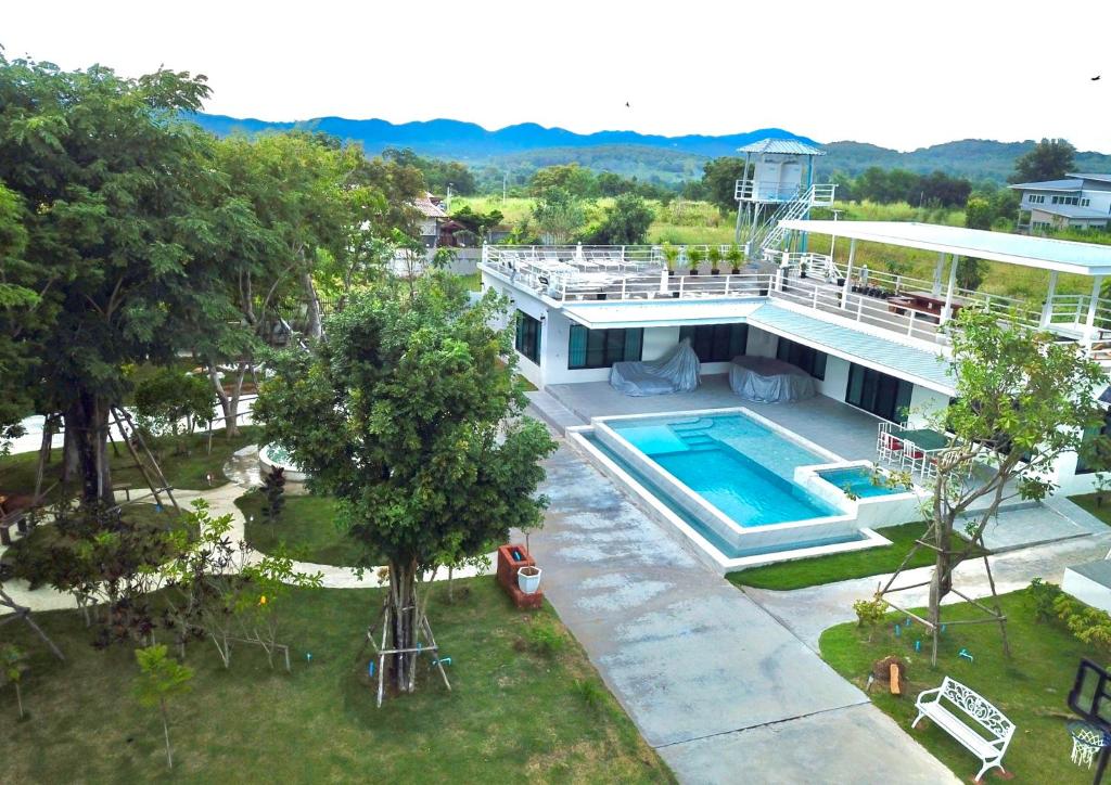 an aerial view of a house with a swimming pool at The Pano Hill in Pak Chong