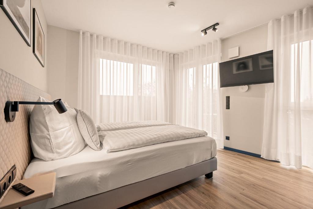 Postel nebo postele na pokoji v ubytování Motel42-Temporary Living
