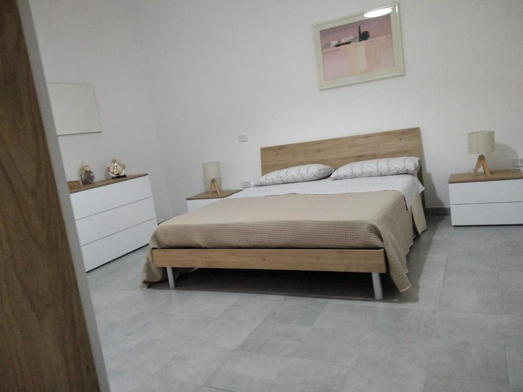 Postel nebo postele na pokoji v ubytování Casa di Matilde