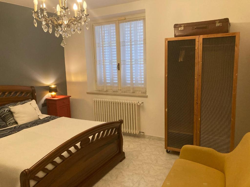 Postel nebo postele na pokoji v ubytování Casa Finestre Bianche