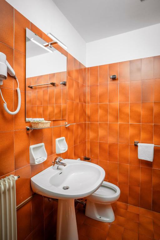 Koupelna v ubytování Hotel Sporting