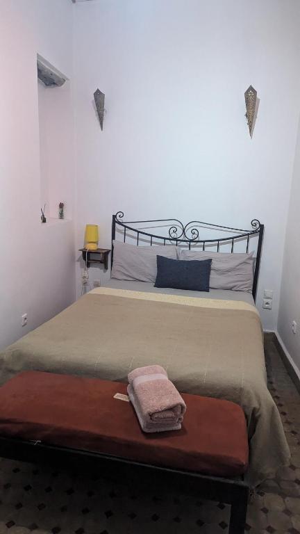 Postel nebo postele na pokoji v ubytování Riad Dar