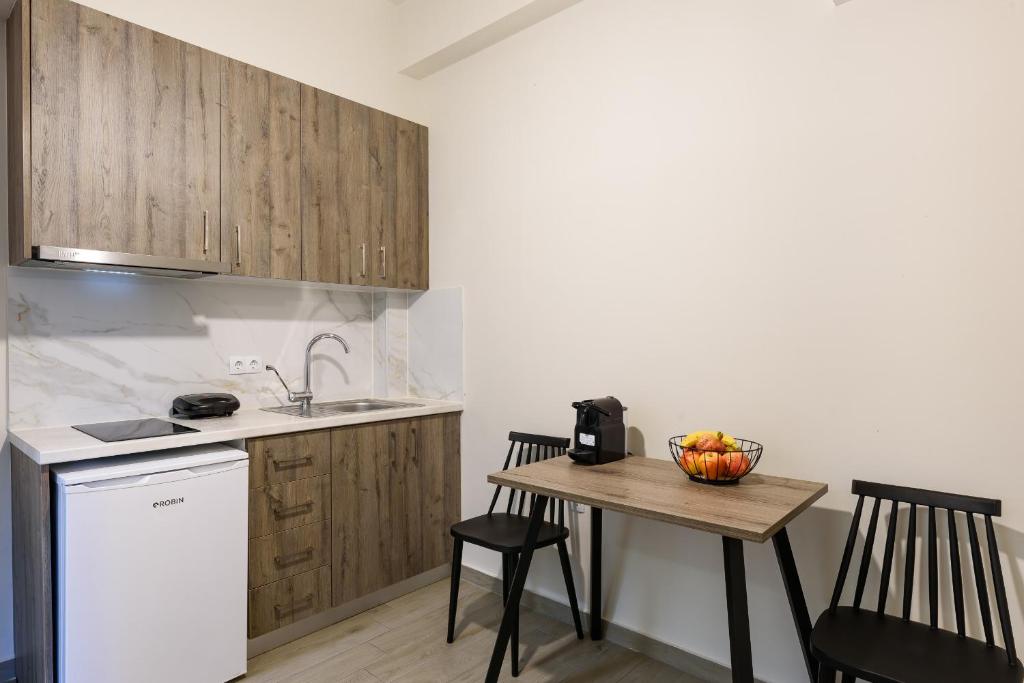 Kuchyň nebo kuchyňský kout v ubytování Philippos Residences