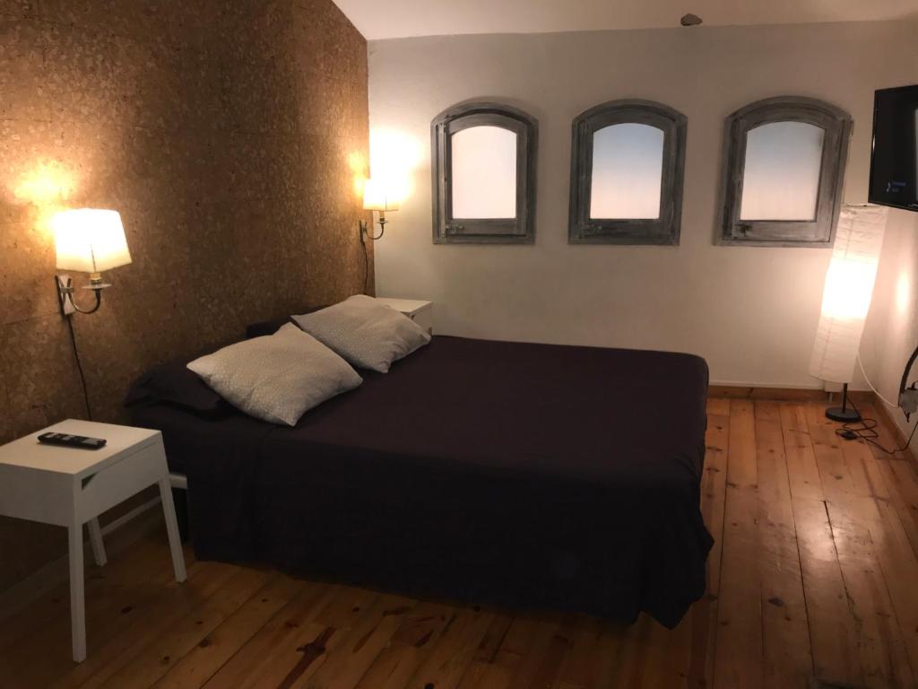 Postel nebo postele na pokoji v ubytování CA LA ROSITA