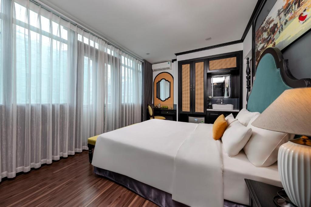 TV a/nebo společenská místnost v ubytování Hanoi Elpis Hotel & Spa