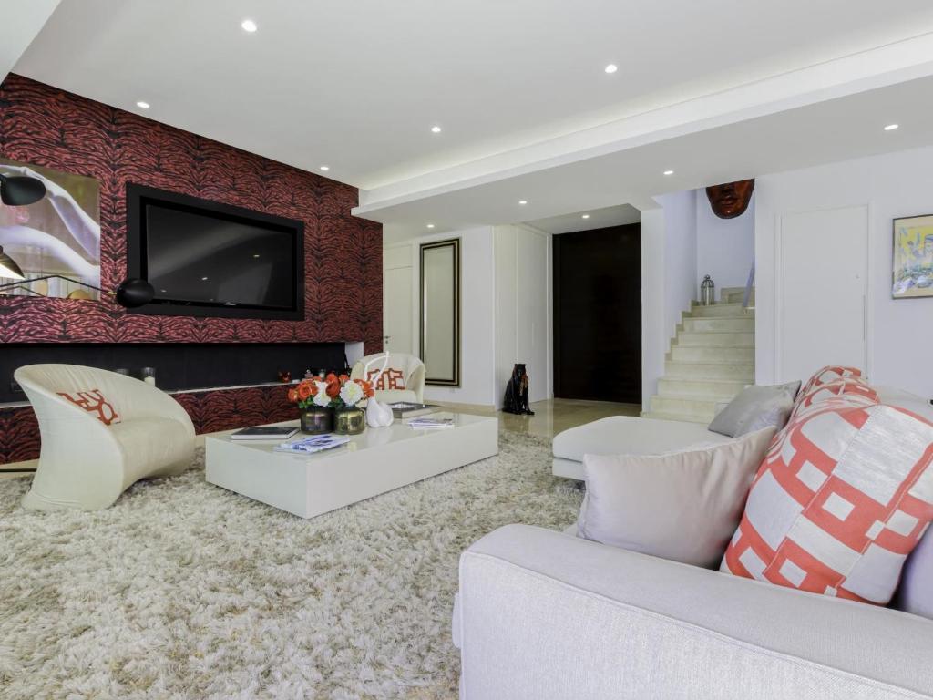 Posezení v ubytování Fantástica Villa moderna en Rio Real