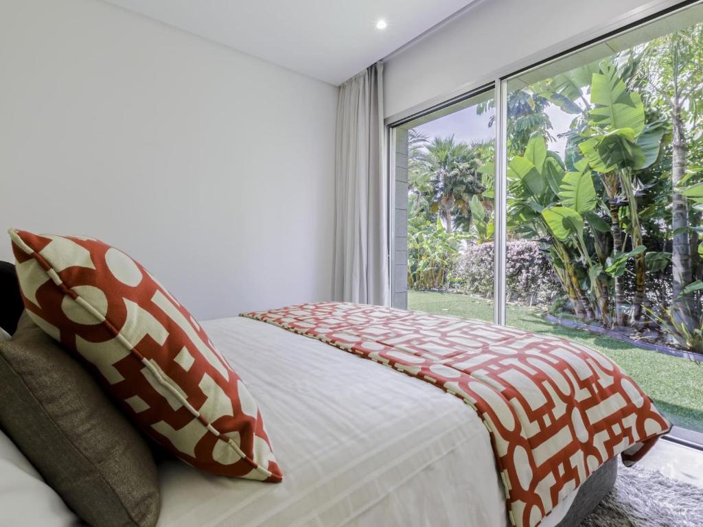 Postel nebo postele na pokoji v ubytování Fantástica Villa moderna en Rio Real